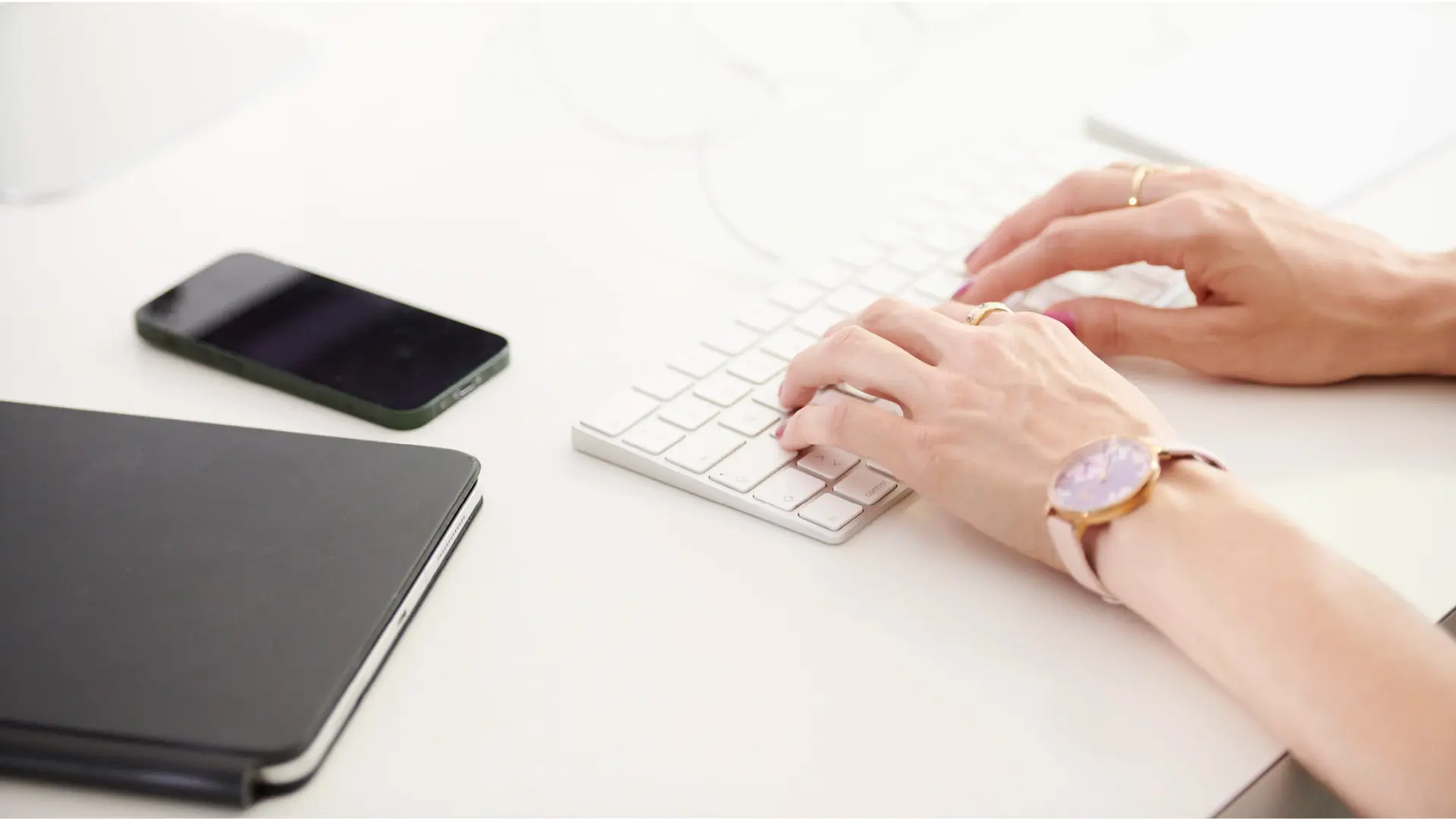 hand on laptop
